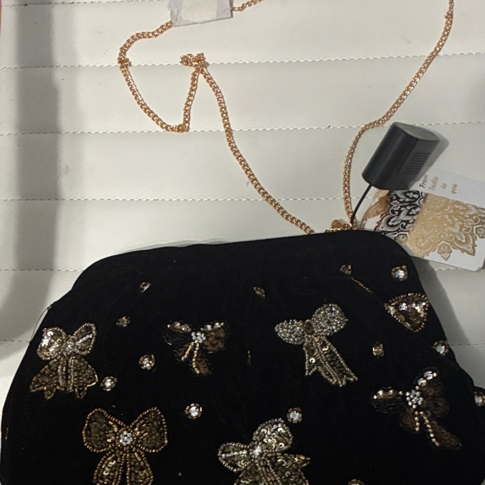 Elegant Black and Gold Embellished Clutch